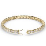 10 Carat Yellow Gold Round Shape Diamond Tennis Bracelet With Prong Setting.